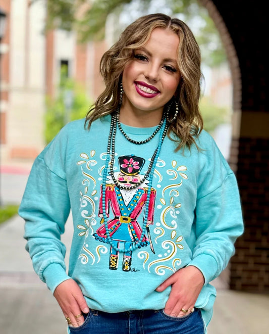 Nutcracker on Turquoise sweatshirt
