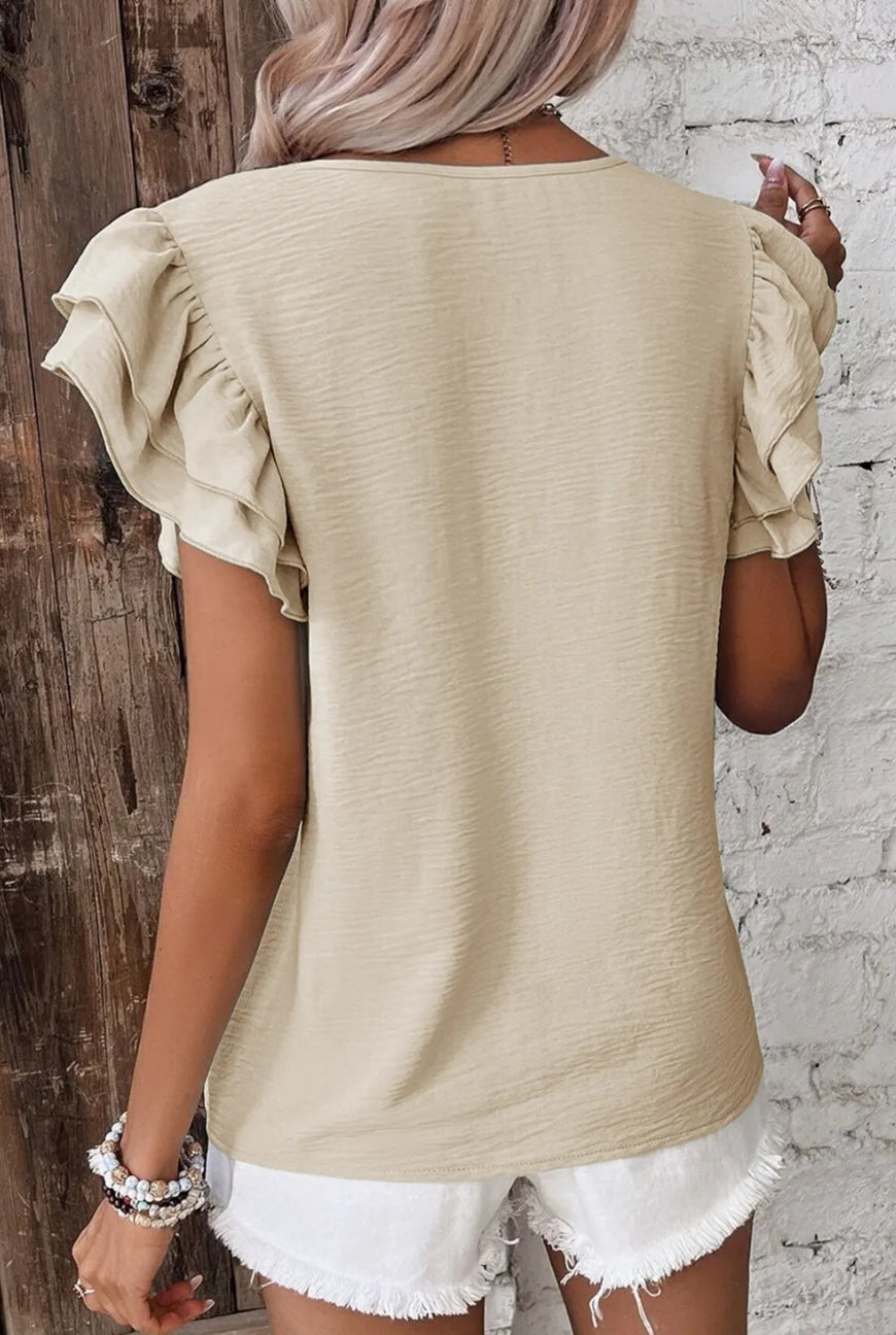 Beige ruffled blouse